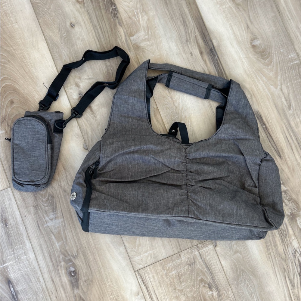 Gray gym bag with shoe pouch and detachable drink/phone holder